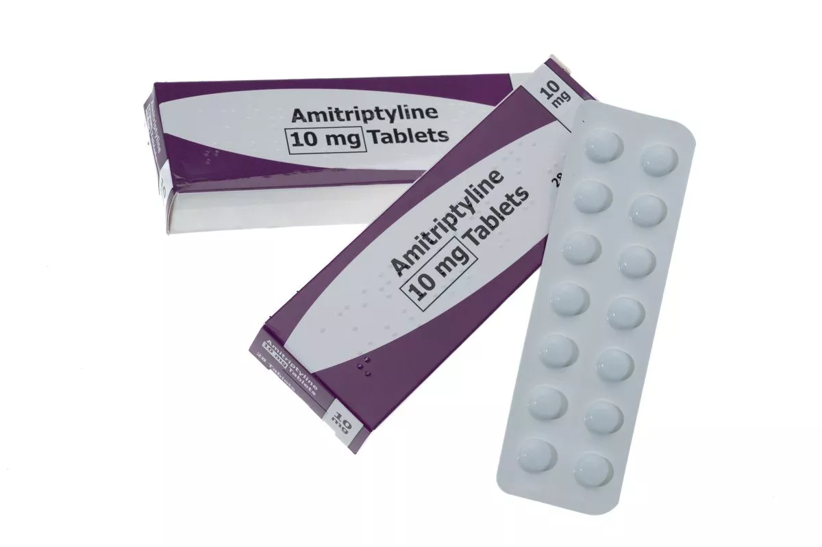 Amitriptyline Hydrochloride pills which are used to treat symptoms of depression and also pain relief