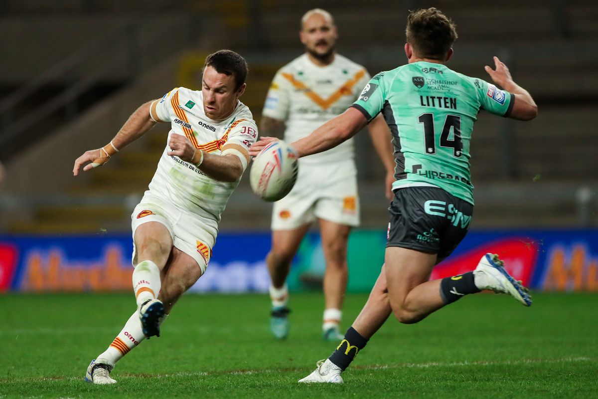  Catalans' James Maloney kicks the winning drop-goal against Hull KR 