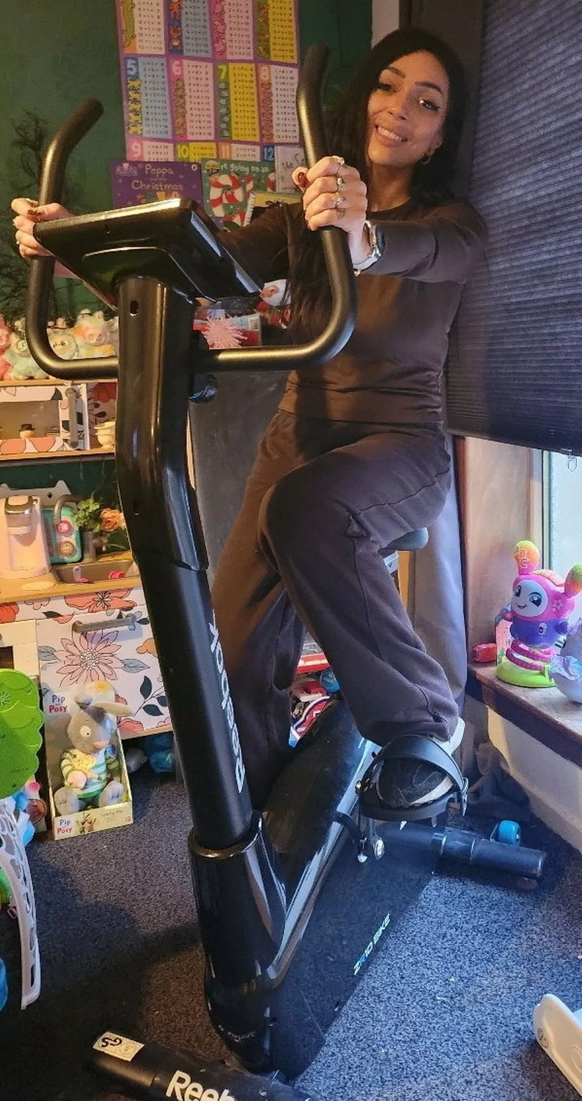 Tammie on exercise bike