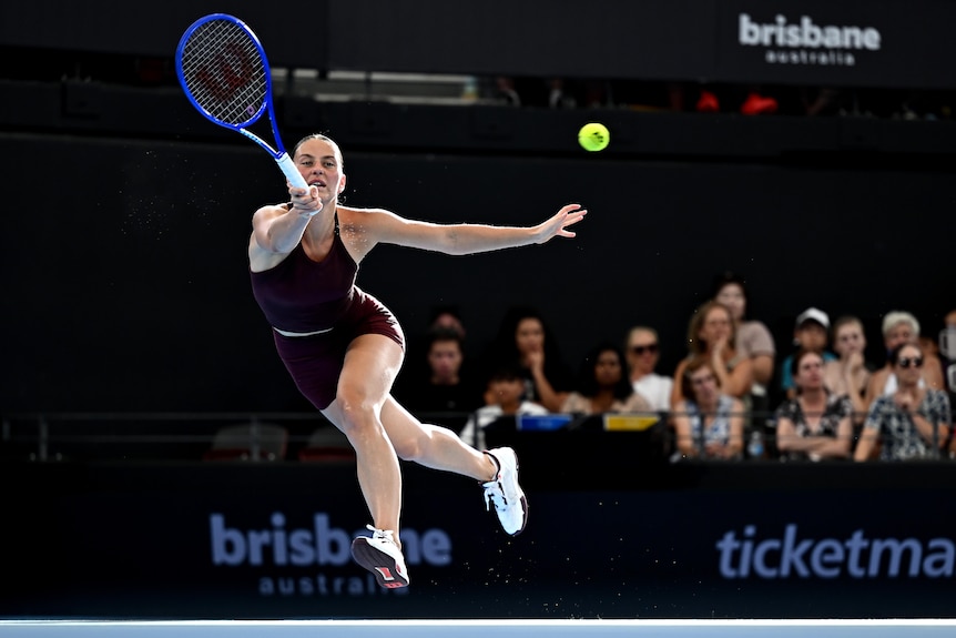 Marta Kostyuk plays a forehand