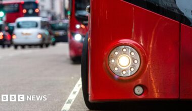 The front of a bus showing the front light