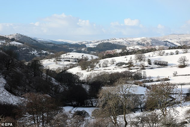 Snow covers the hills in Llangollen, Wales, as arctic air from Scandinavia moves across the UK