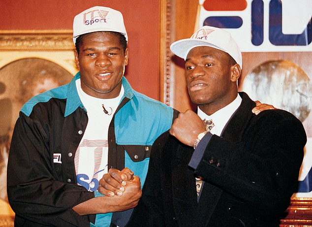 Riddick Bowe (left) poses for the cameras with British heavyweight Herbie Hide in February 1993