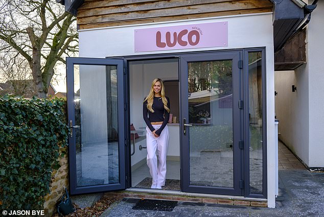 Ms Smith pictured in the doorway of her Pilates business in her garden in Norfolk