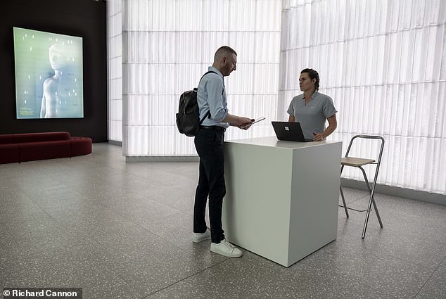 Dr Max arrives at the main reception of the Neko Health centre in Liverpool Street in London