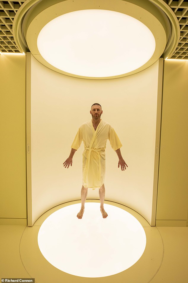 Dr Max prepares for the Neko skin scanner, which finds he has 812 marks on his skin