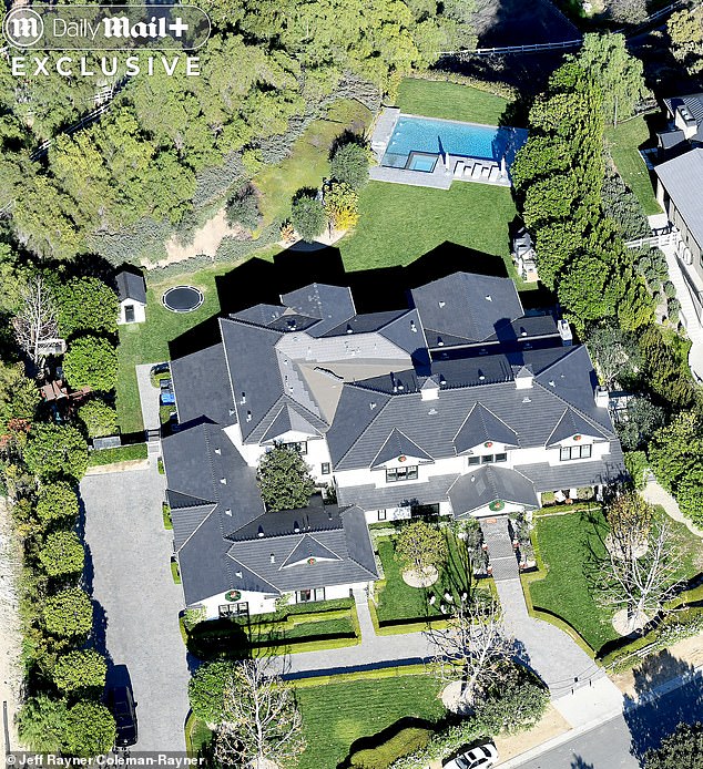 Kylie's home. She also decked out the entrance of her home with oversized nutcracker-style Christmas soldiers and festive wreaths visible