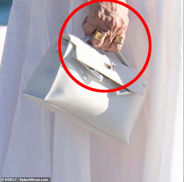 Kris Jenner's hands show her veins as she boards a luxury yacht in St Barts