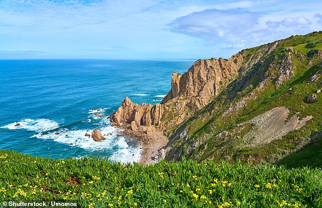 The dramatic coastal cliffs at Cabo da Roca in Portugal offers panoramic views of the rugged coastline and the Serra de Sintra