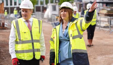 Building slump: Berkeley chief executive Rob Perrins (pictured, left, with Chancellor Rachel Reeves) said taxes and red tape were holding the industry back