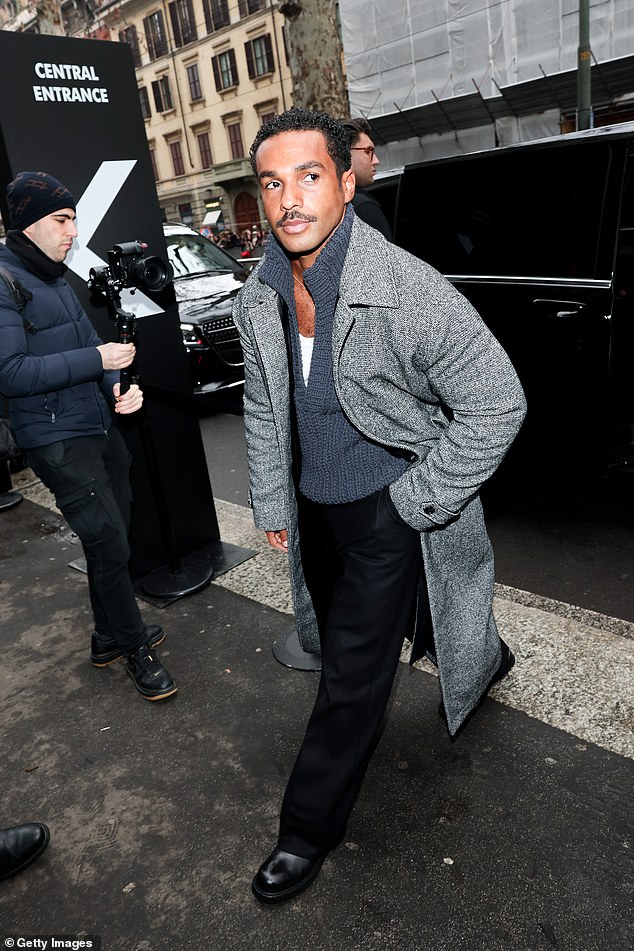 Lucien Laviscount showed off his dashing new moustache as he arrived at the Dolce & Gabbana show during Milan Fashion Week on Saturday