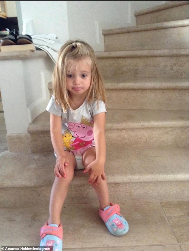Alongside, Amanda also posted an adorable throwback shot of Hollie as a toddler, sporting a Peppa Pig branded T-shirt and coordinating slippers