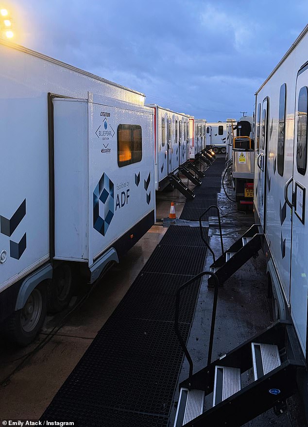 Hinting at an early start today as she continues to film, Emily, who stars in the Disney+ series as Sarah Stratton, shared a snap of a collection of actors' trailers at dawn