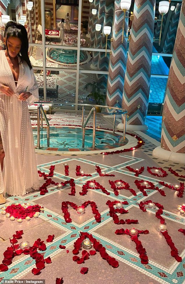 Taking to Instagram on Friday, the mother-of-five shared a slew of snaps as she posed by a sea of red roses spelling out 'will you marry me?'