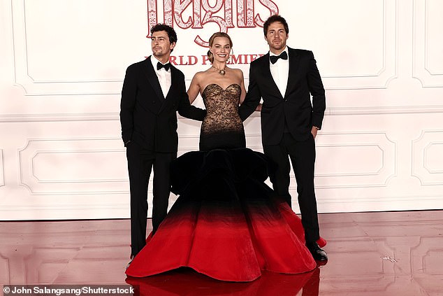Robbie's husband Tom Ackerley supported his superstar spouse at the premiere; the couple seen with fellow Wuthering Heights producer Josey McNamara