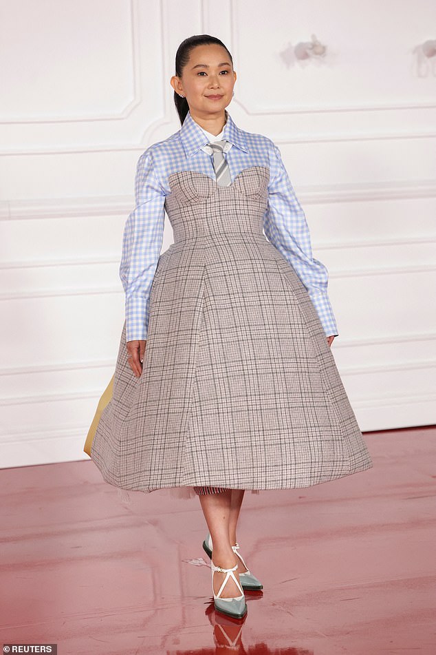 The actress, 46, who has appeared in acclaimed films like The Whale (2022) and Downsizing (2017), stood on blue heels with white ankle straps