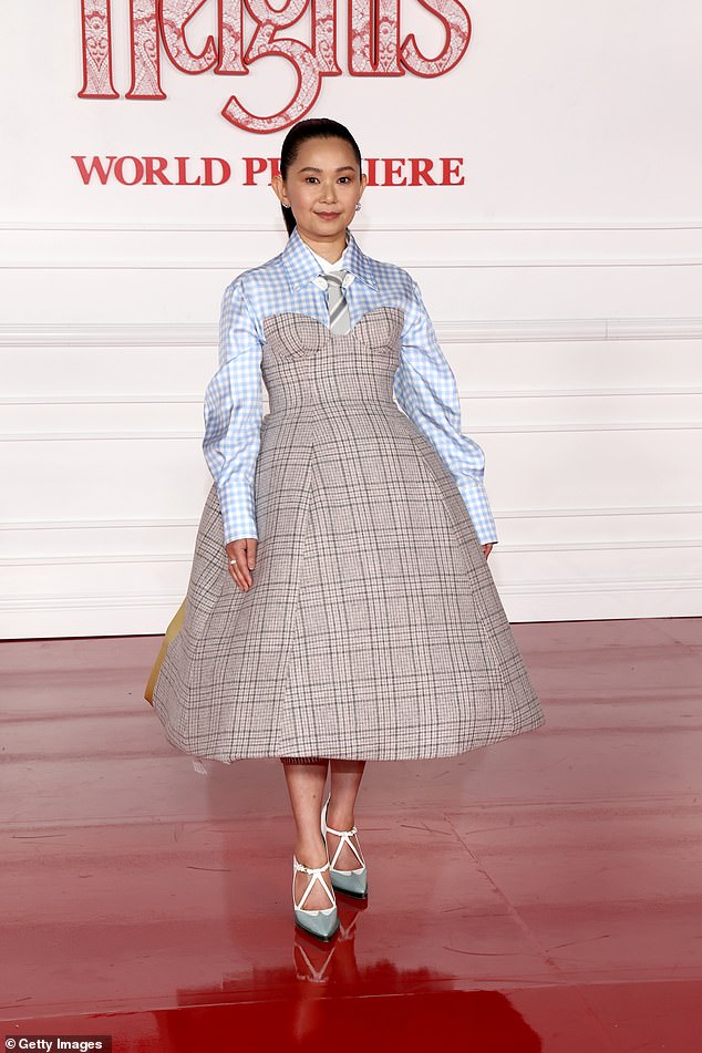 Hong Chau turned heads in a gray plaid strapless dress layered over a blue gingham shirt