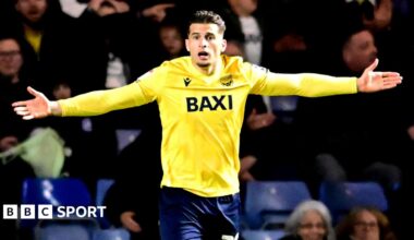 Ruben Rodrigues gestures with his arms out wide while playing for Oxford United
