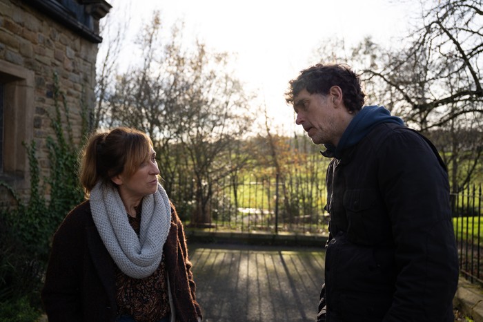 Laurel shouts at Marlon outside of the church in Emmerdale