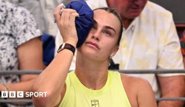 Aryna Sabalenka holds an ice pack to her head during her victory over Sorana Cirstea at the Brisbane International