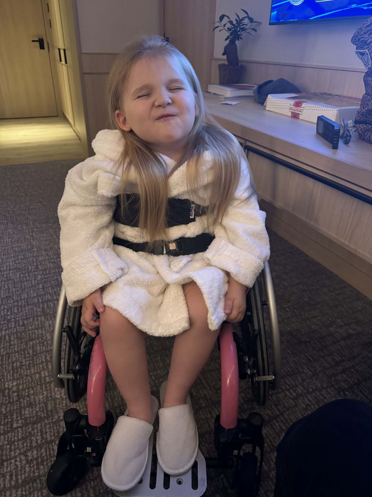 The little girl uses a wheelchair as the condition has worsened