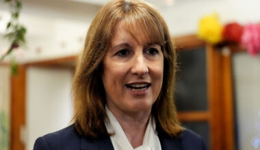 Rachel Reeves delivering a speech at a business conference, highlighting economic strategies and engaging with an audience.