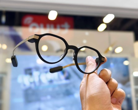a person holding Even Realities G2 smart glasses