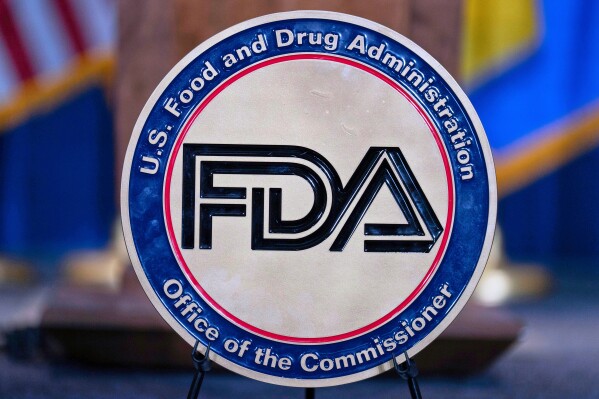 The Food and Drug Administration seal is seen at the Hubert Humphrey Building Auditorium in Washington, April 22, 2025. (AP Photo/Jose Luis Magana, File)