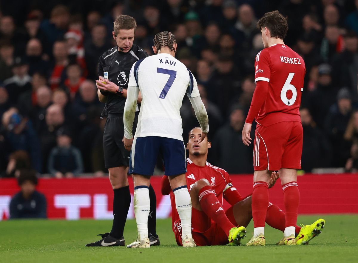 Xavi Simons of Tottenham Hotspur reacts toward Virgil van Dijk