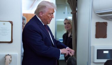 Donald Trump discuses the bruising on his hand with reporters aboard Air Force One after leaving the World Economic Forum in Davos. Pic: AP