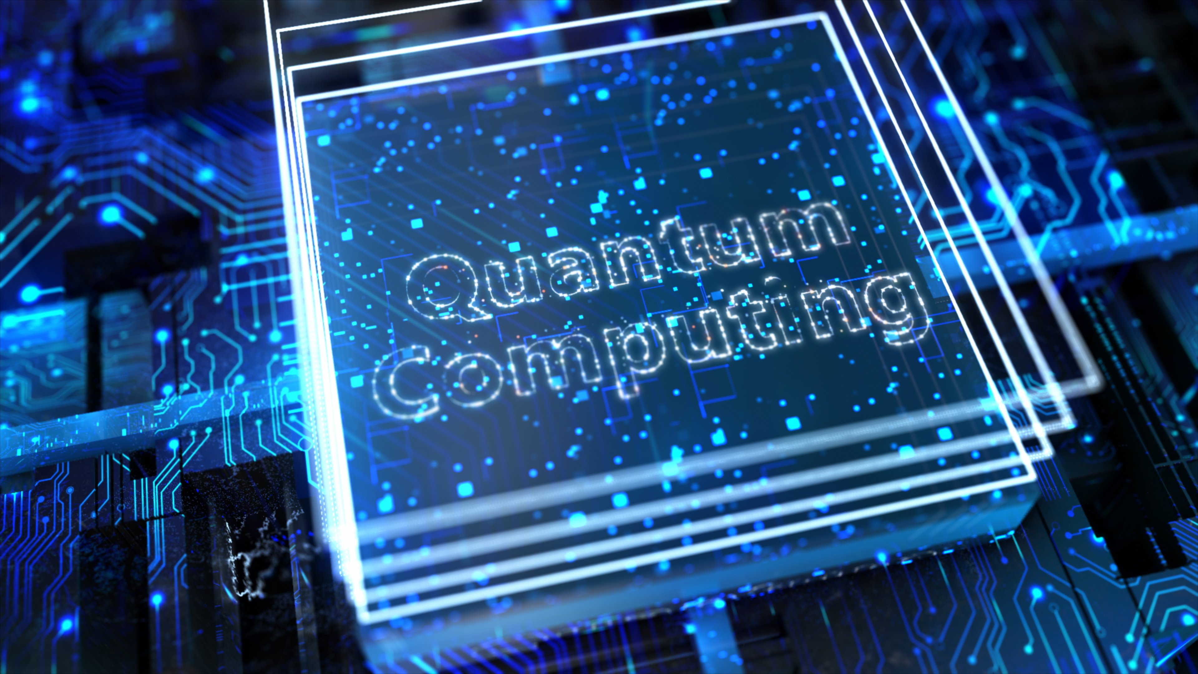 "Quantum Computing" in lights next to images of boxes and circuits.
