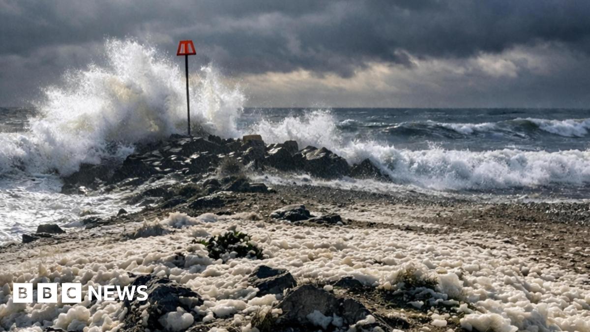 Highcliffe, Christchurch Dorset - beach with large waves crashing in