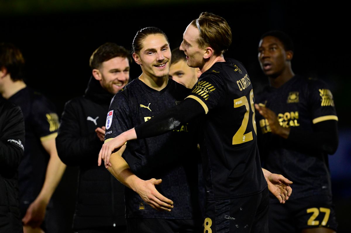 Lorent Tolaj (left) and Ronan Curtis celebrate after Argyle's 4-3 win against Bristol Rovers in the Vertu Trophy round of 16 at the Memorial Stadium on January 13, 2026 - Photo: Tom Sandberg/PPAUK
