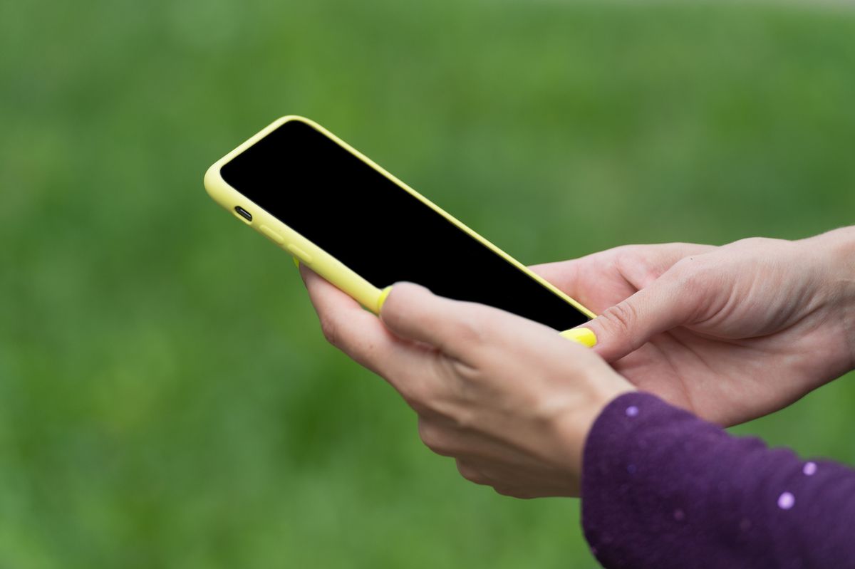 Mobile phone in female hands