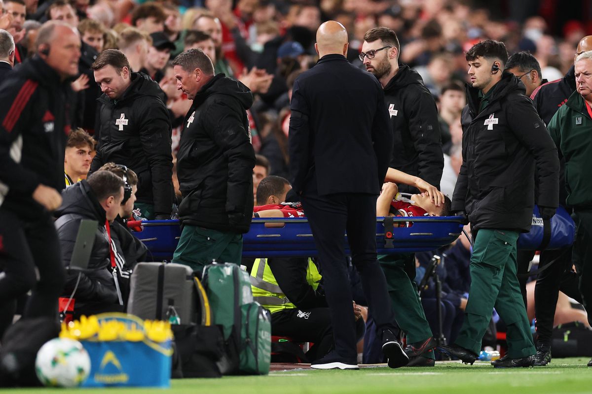 Giovanni Leoni of Liverpool is stretchered off having suffered an injury during the Carabao Cup Third Round match between Liverpool and Southampton at Anfield.