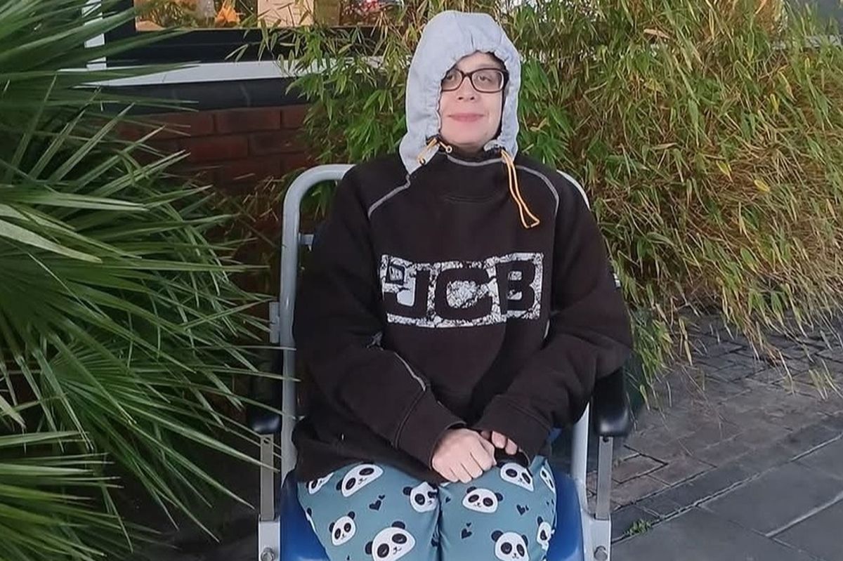 Clare Garrett sat in a wheelchair