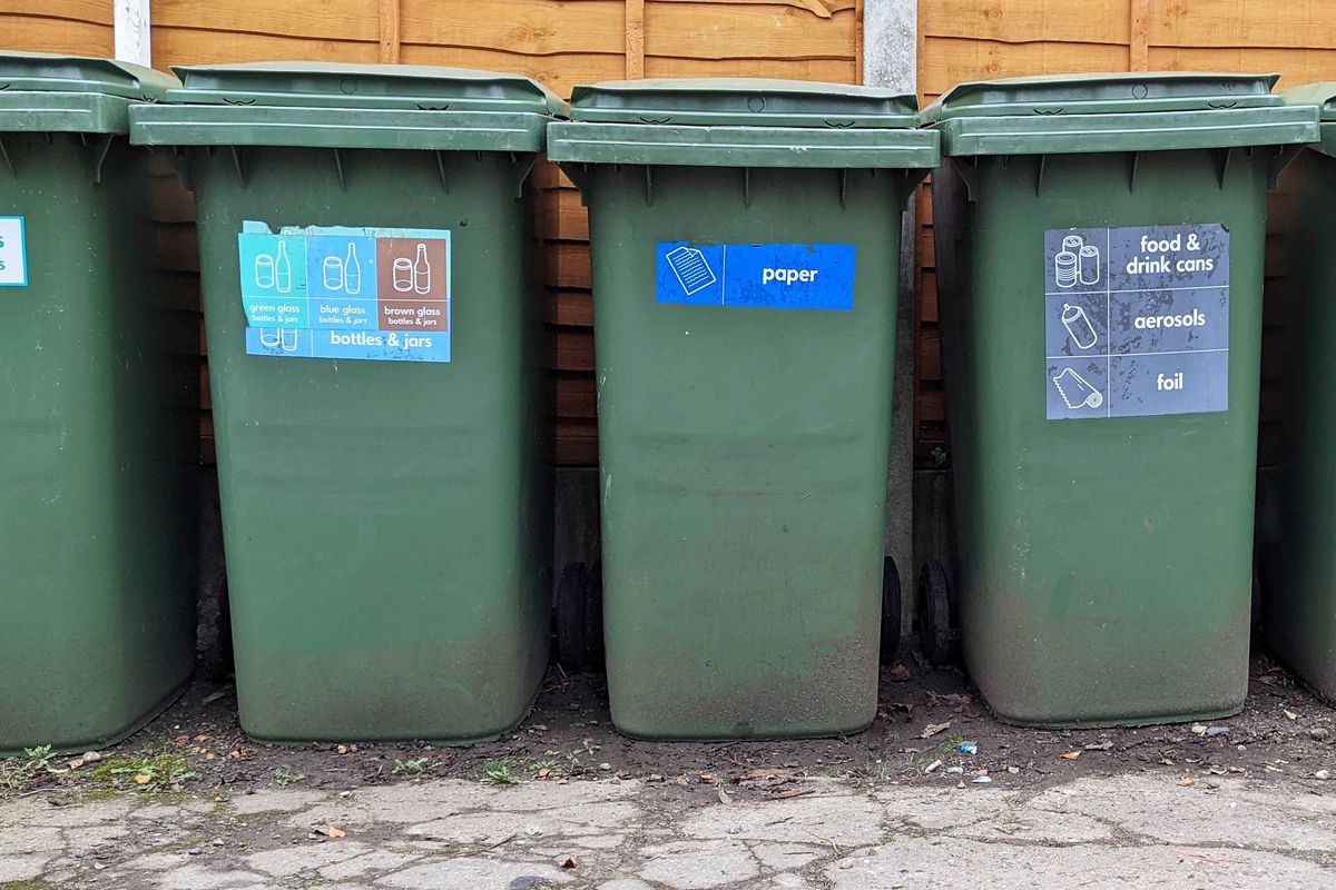Various residential recycling bins in a row