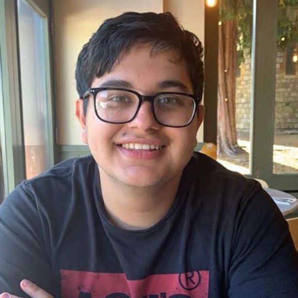 A family photo of Ryan Sandhu, 21, smiling , who died after a three-car crash on the A38(M) Aston Expressway in Birmingham