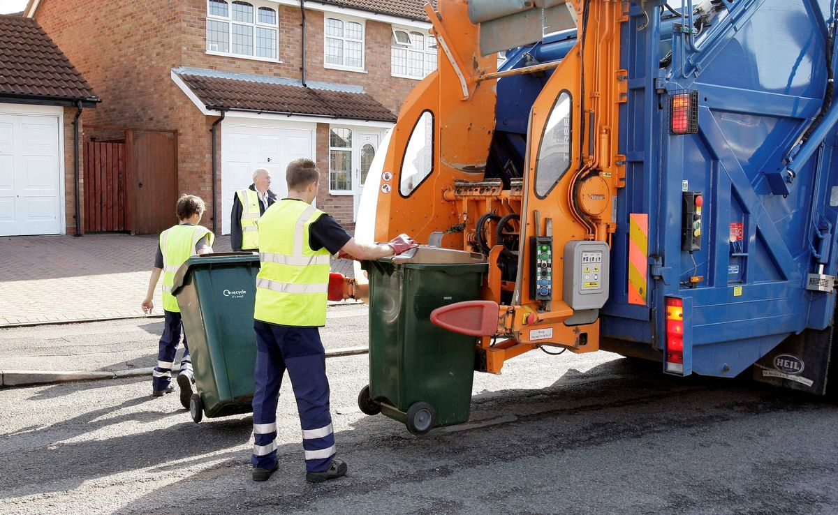 Bin men have a tough job (stock)
