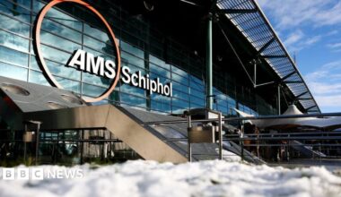 Snow lies on ground outside Schiphol Airport in Amsterdam