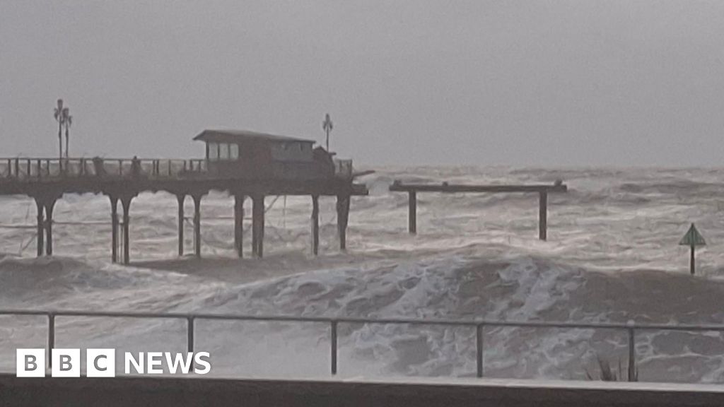 Pier washes away and railway sea wall crumbles as storm lashes South West