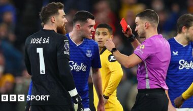 Michael Keane of Everton is shown the red card by referee Thomas Kirk