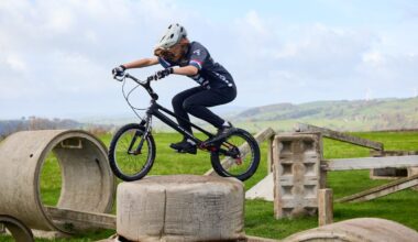 Daisy Craig riding MTB trials in an MBUK photo shoot