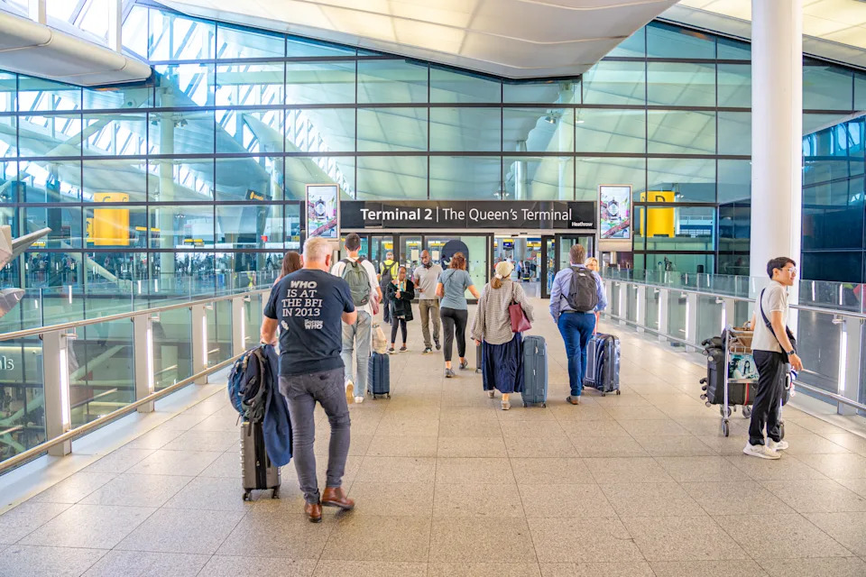 Entrance to Terminal 2, the Queen's, at Heathrow Airport, London. 