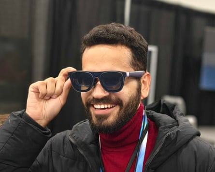 a person wearing Xreal 1S AR glasses