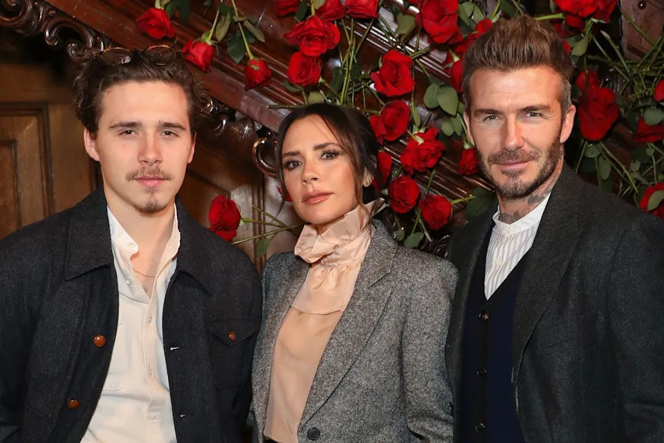 Darren Gerrish/Darren Gerrish/WireImage Brooklyn, Victoria and David Beckham attend the Kent & Curwen presentation during London Fashion Week Men's January 2019.