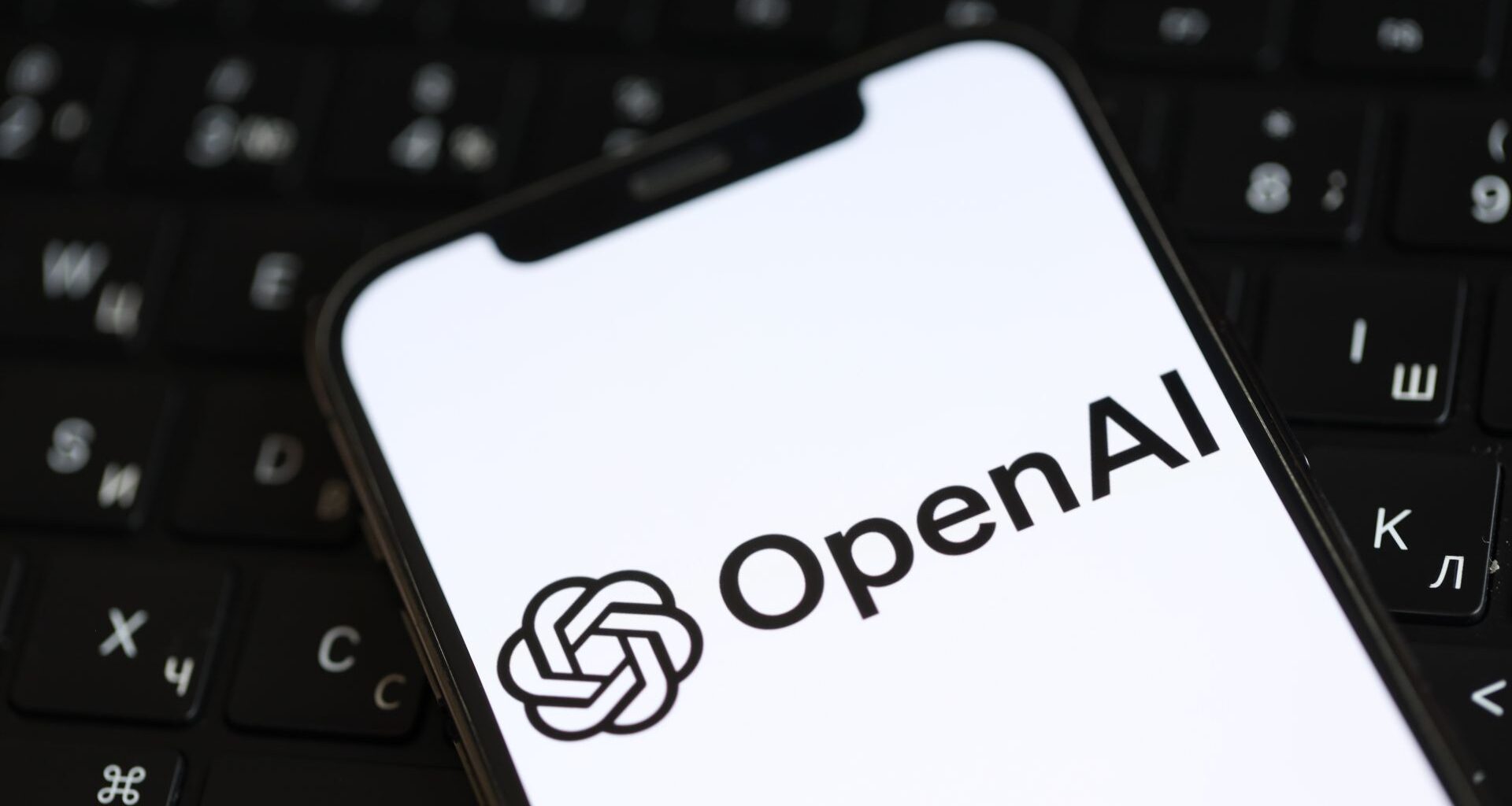 OpenAI logo on a smartphone screen