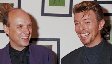 UNITED KINGDOM - CIRCA 1994: Brian Eno (L) and David Bowie attend a private view of charity exhibition "War Child: Little Pieces From Big Stars" at Flowers East Gallery in September 1994 in London, England. (Photo by Dave Benett/Getty Images) Davidbowieretro