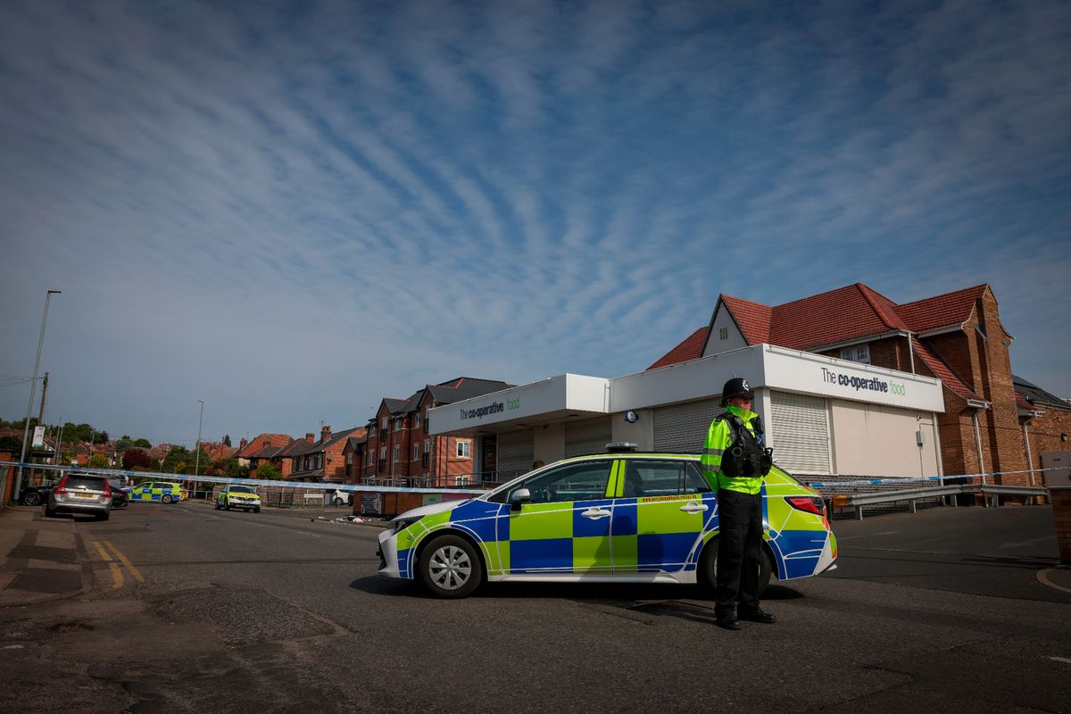 Police pictured at the scene in Westdale Lane East, Carlton, following the stabbing