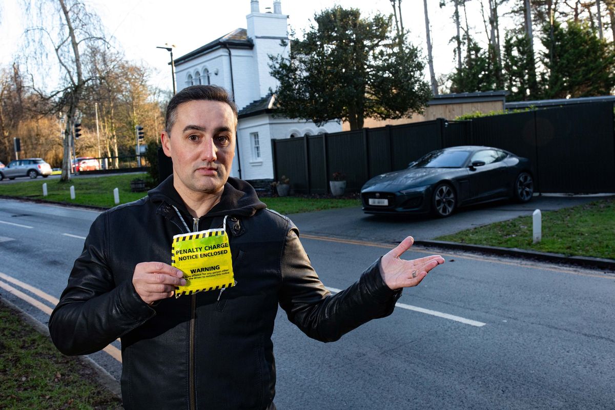 David Miller stood outside his home and beside where his car was parked at the time that he received the parking ticket. 